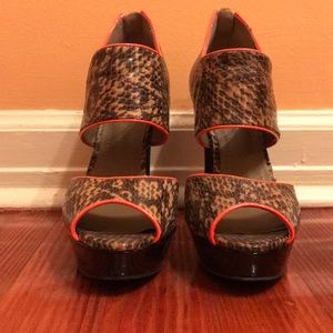 BCBGeneration Snakeskin Platform Pumps
